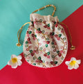 Printed Potli Bag with flowers around it