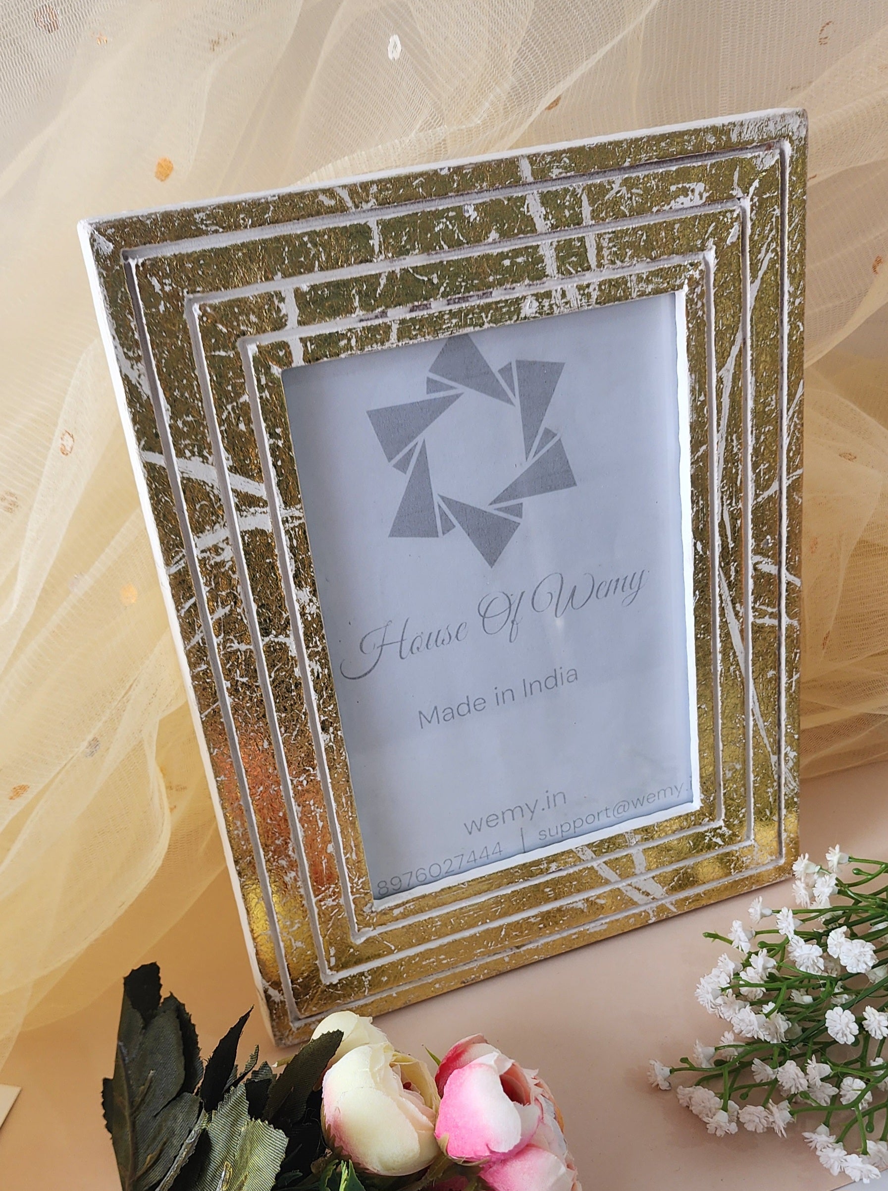 Best Foil Golden Photo Frame with flowers around it