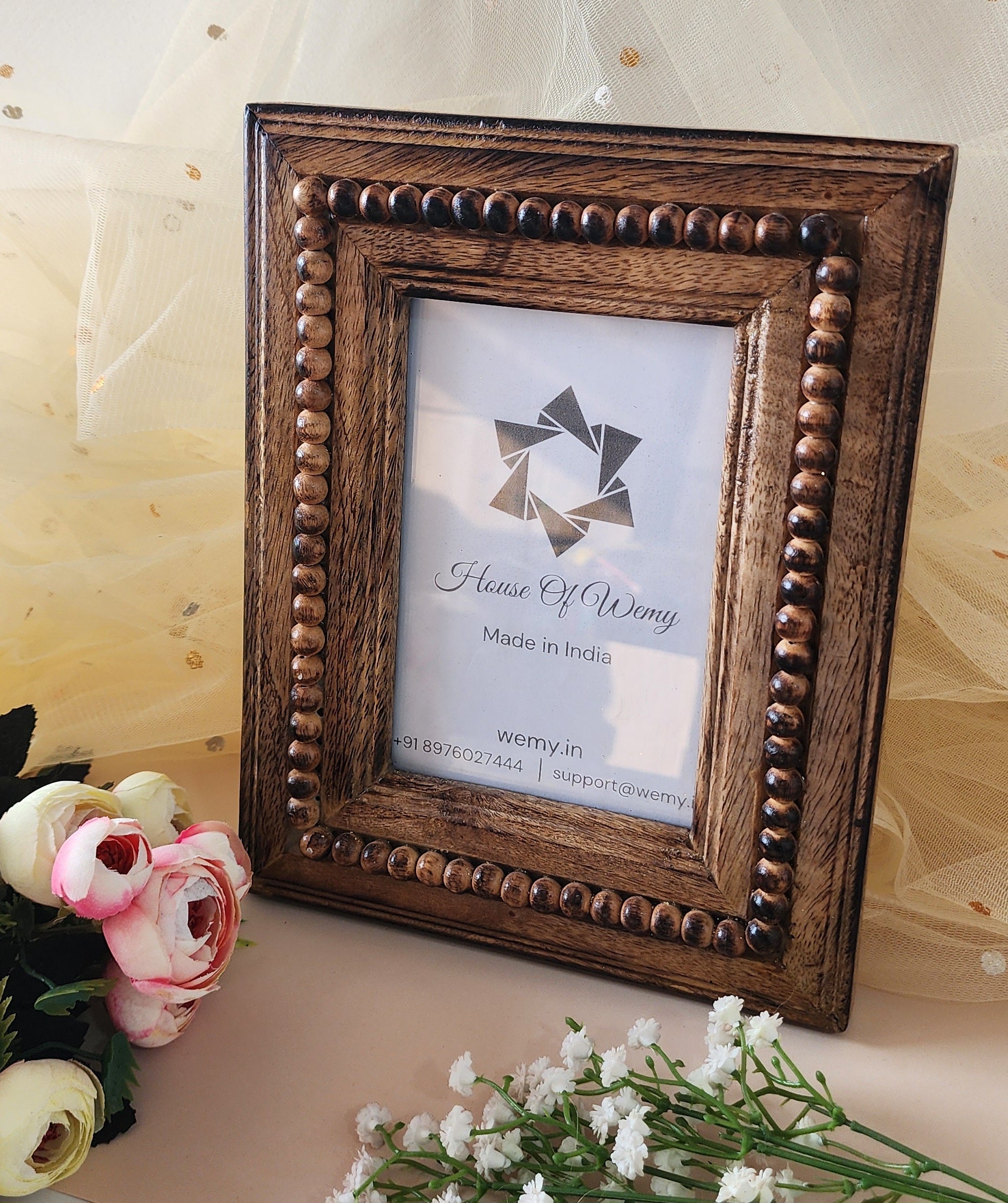 Exquisite Boondi Frame made of Mango Wood with flowers around it
