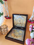 Gold platted wooden open Lord Mahavir Pocket Temple with flowers and with red rose on white mala