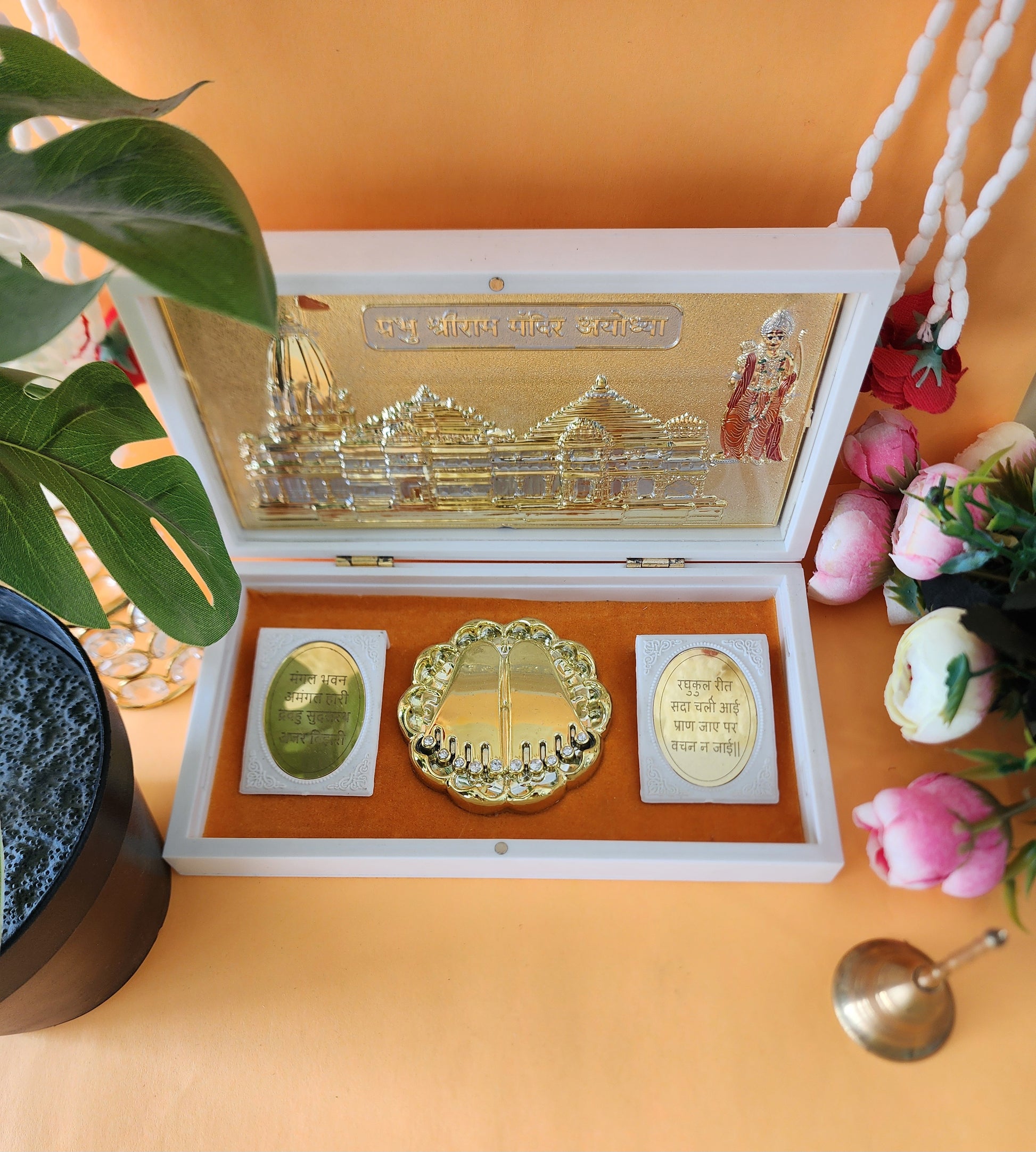 A beautifully crafted, portable Shree Ram Mandir Pocket Temple in a pristine white case, perfect for home decor or gifting.