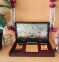 A Lord Shiva pocket temple featuring a central golden relief of Lord Shiva, surrounded by smaller golden plaques with sacred Sanskrit inscriptions like