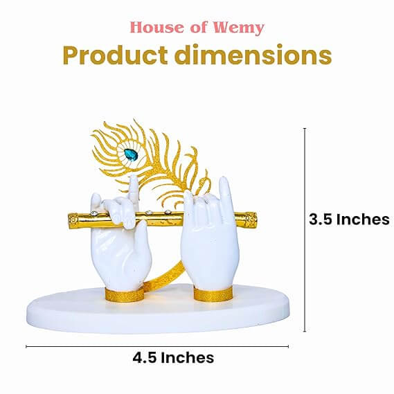 White polyresin Lord Krishna hands idol holding a golden flute with a peacock feather, presented on a white oval base with product dimensions of 3.5 inches height and 4.5 inches width.