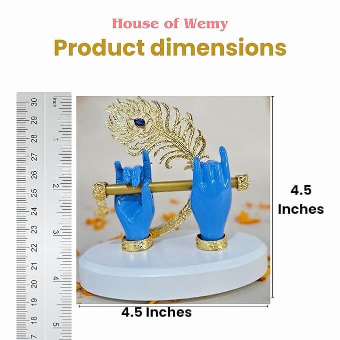 A close-up of a Krishna Hand Flute Statue on a white base, featuring two blue hands holding a golden flute, adorned with a golden peacock feather with a blue gem. A ruler on the left side and text on the right indicate the statue's height as 4.5 inches. The top of the image also shows 'House of Wemy Product dimensions'.