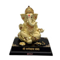 4.5-Inch Gold Plated Lord Jewelry Ganesha Idol with Yellow Color on the black color base