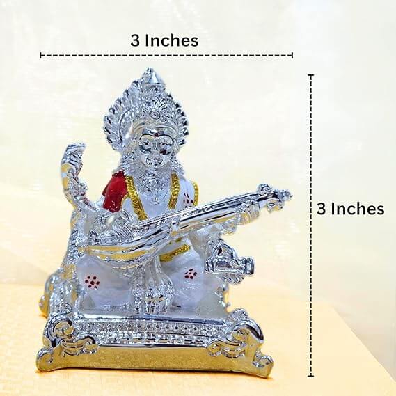 Silver-plated idol of Goddess Saraswati playing the Veena, measuring 3 inches in height and width.