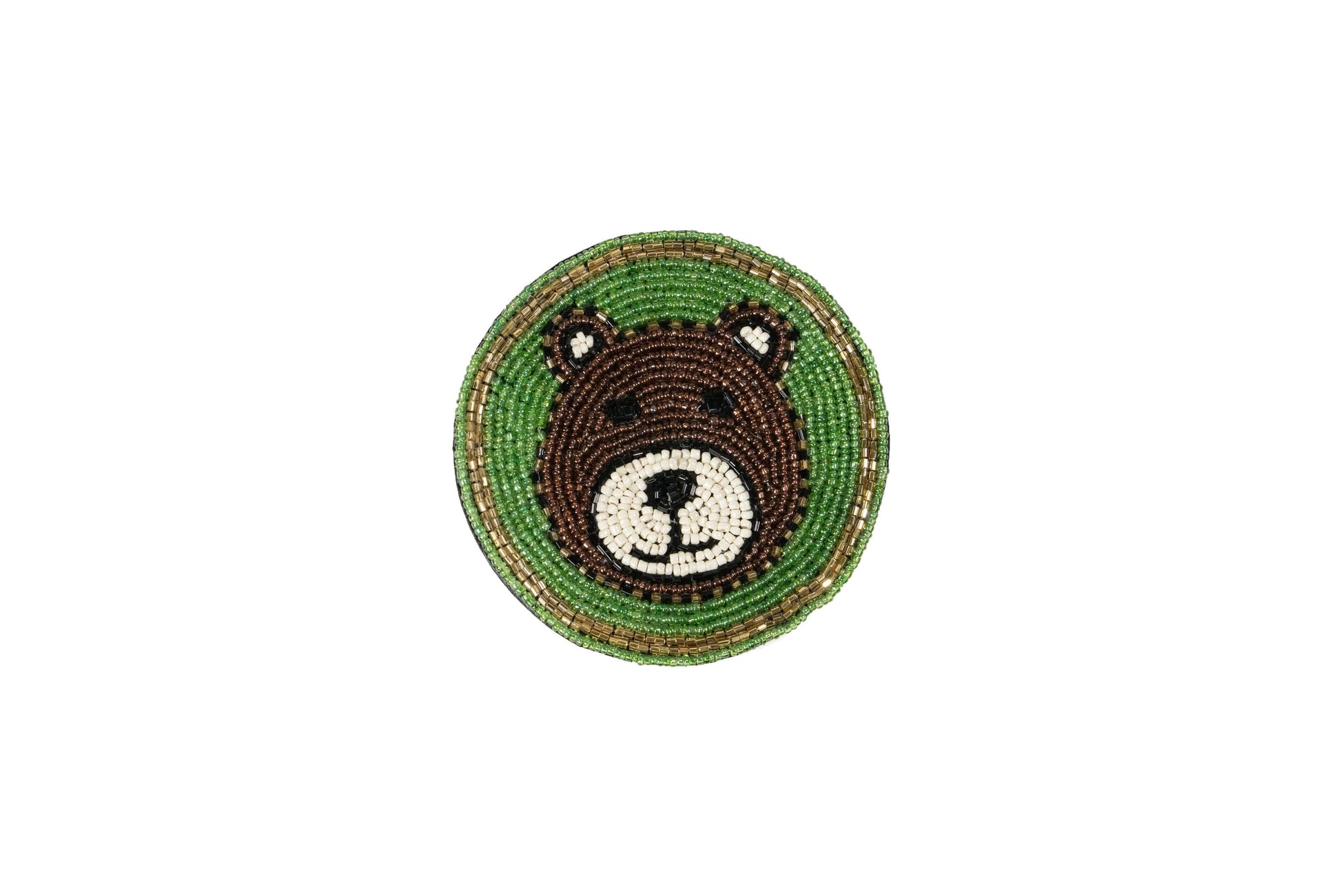 A single round Beaded Coasters - Safari Theme coaster, featuring a bear's face made of brown and white beads, set against a green beaded background with a gold-colored beaded border.
