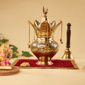 brass kalash with ganesh ji idol with it
