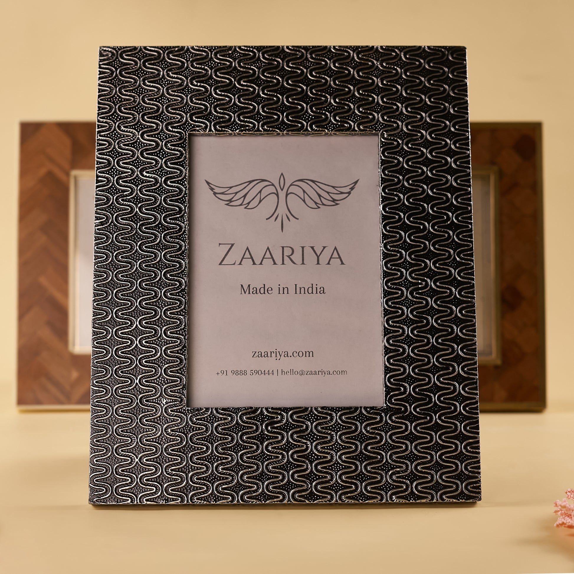 Wooden Silver one Photo Frames standing and 2 photo frames behind