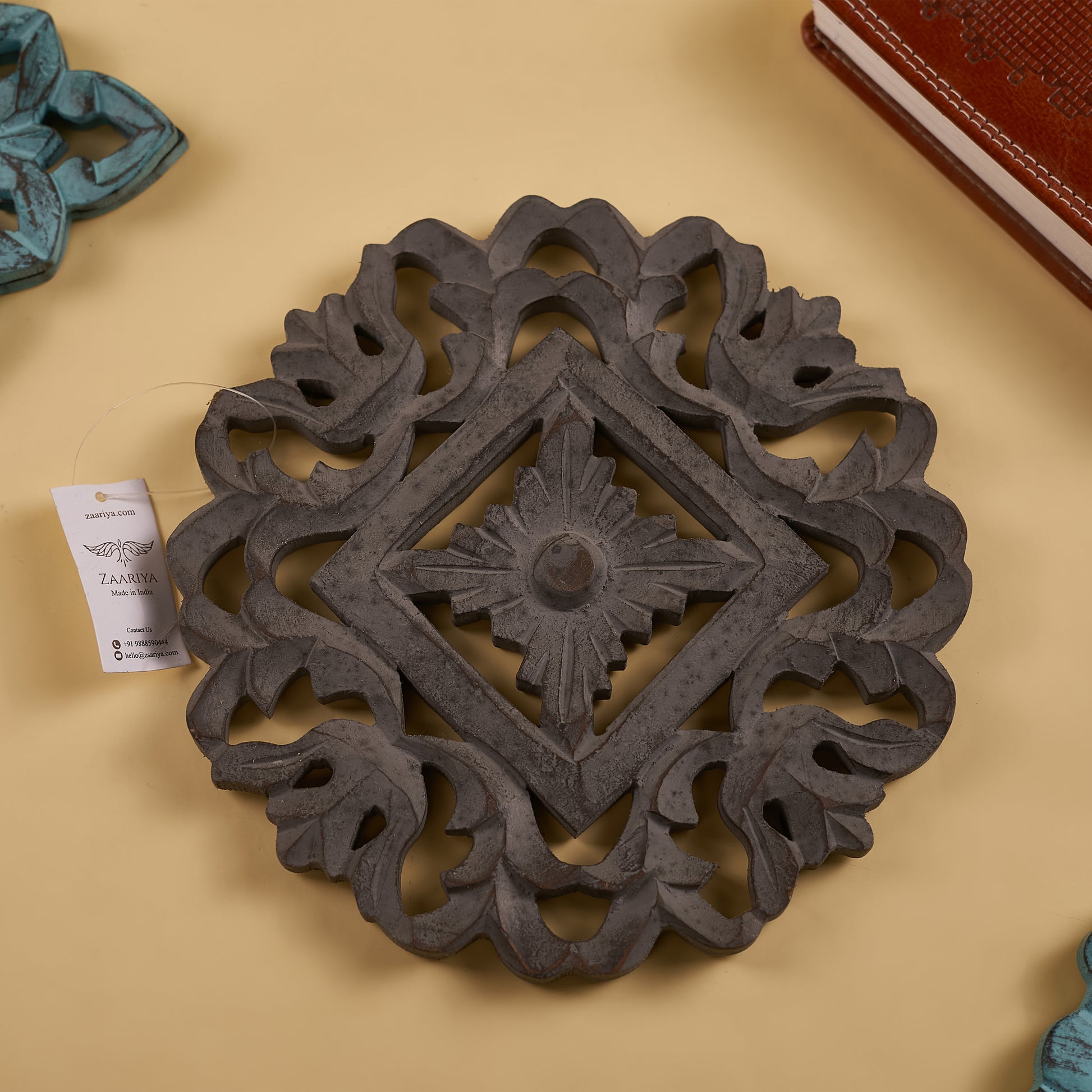 handcrafted wooden trivet with green trivet