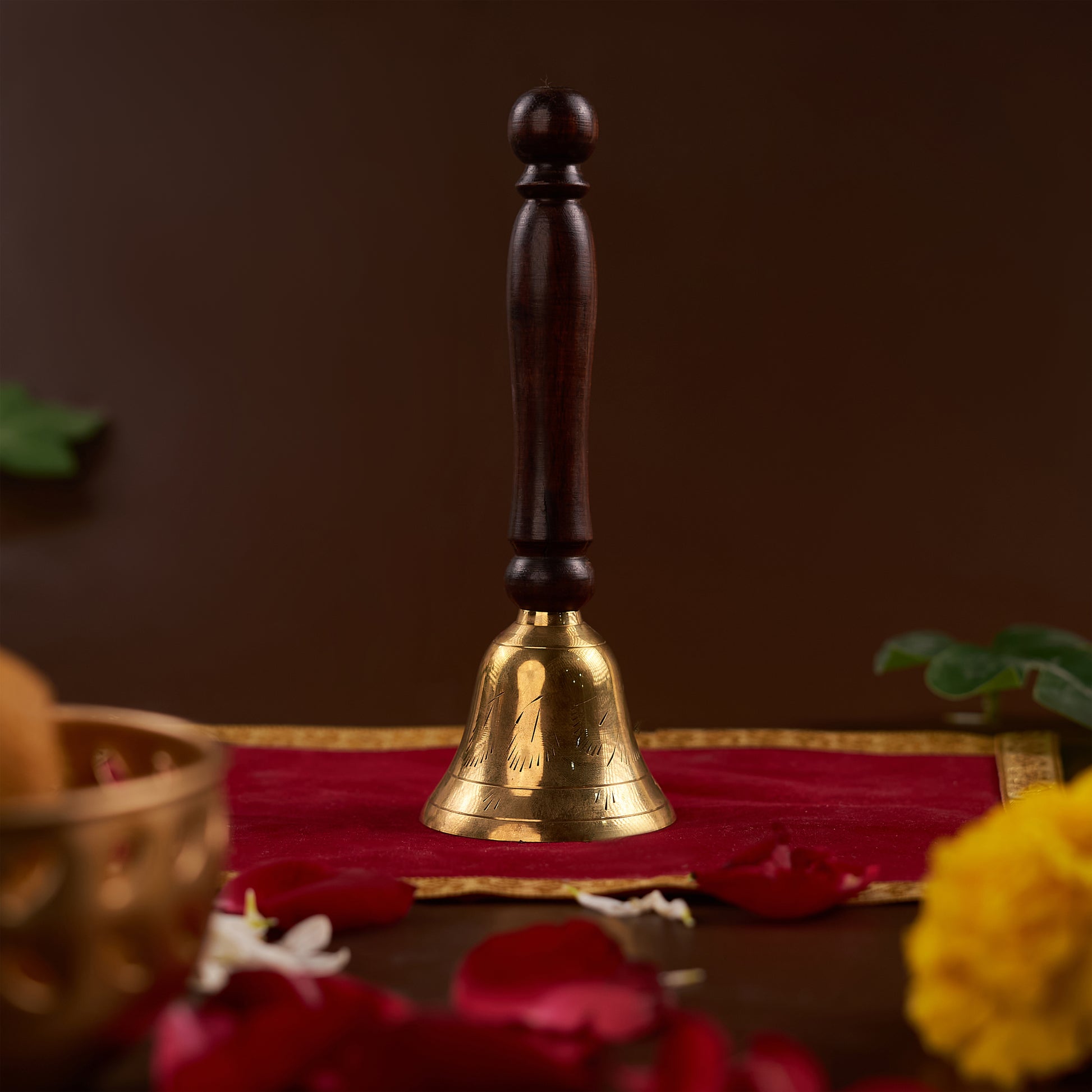 Brass Bell with Wooden Handle standing up straight