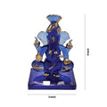A blue crystal Ganesha idol with gold accents is shown, wearing a pagri. The statue is measured at approximately 2 inches wide and 3 inches tall, and it is displayed against a white background.
