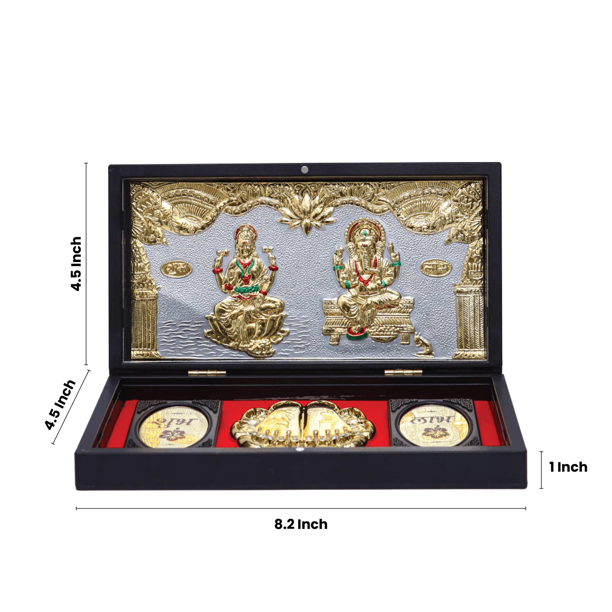 A black framed gift box containing golden idols of Goddess Lakshmi and Lord Ganesha, a pair of golden Lakshmi Charan Padukas (footprints), and two golden coins inscribed with the word "subh labh". The box is open, showcasing the religious items arranged inside against a red velvet lining, with dimensions of 4.5 inches height and 8.2 inches width visible on the box.