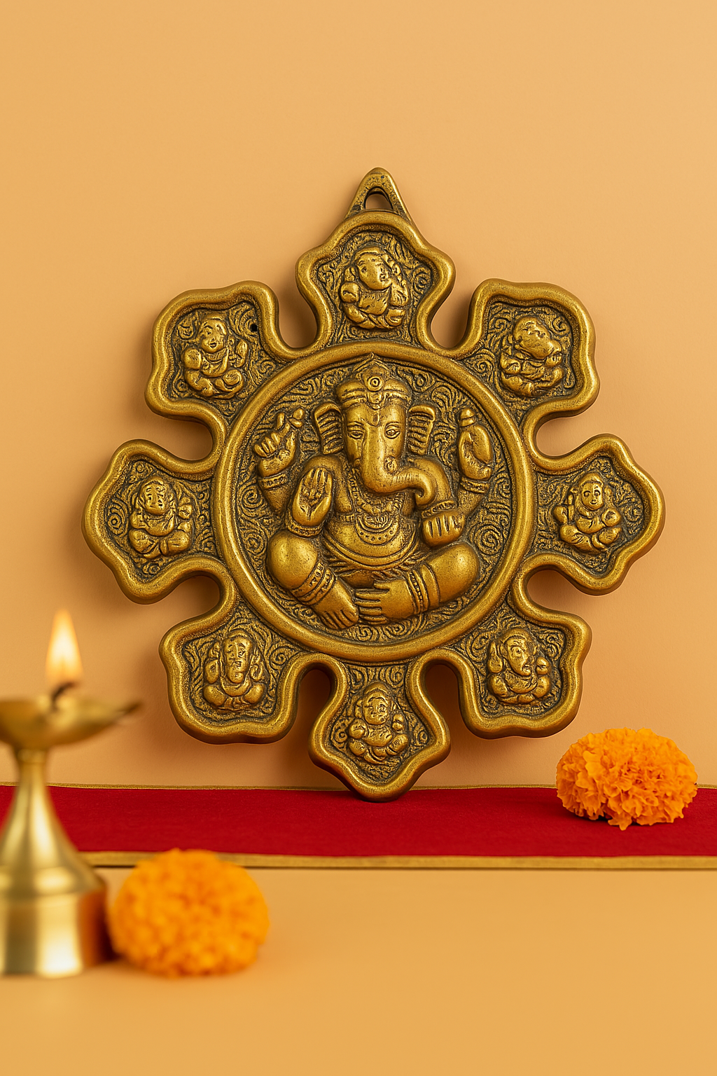 Ganesha Metal Wall hanging standing on the orange wall on the red carpet.
