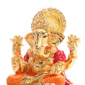 Gold palated ganapati ji idol with the white color background on his back