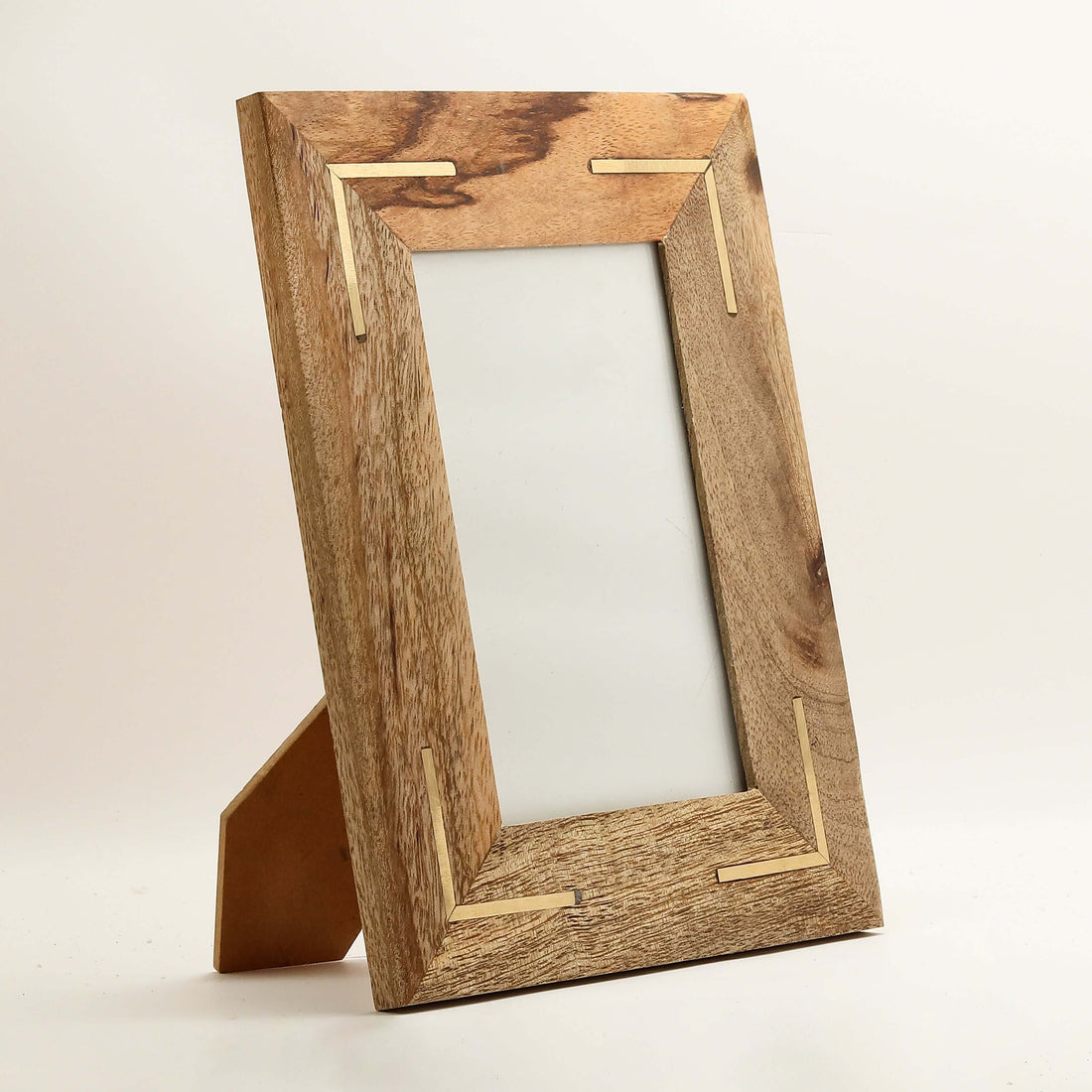 A wooden picture frame with a mirrored glass panel and gold-colored metal frame details.
