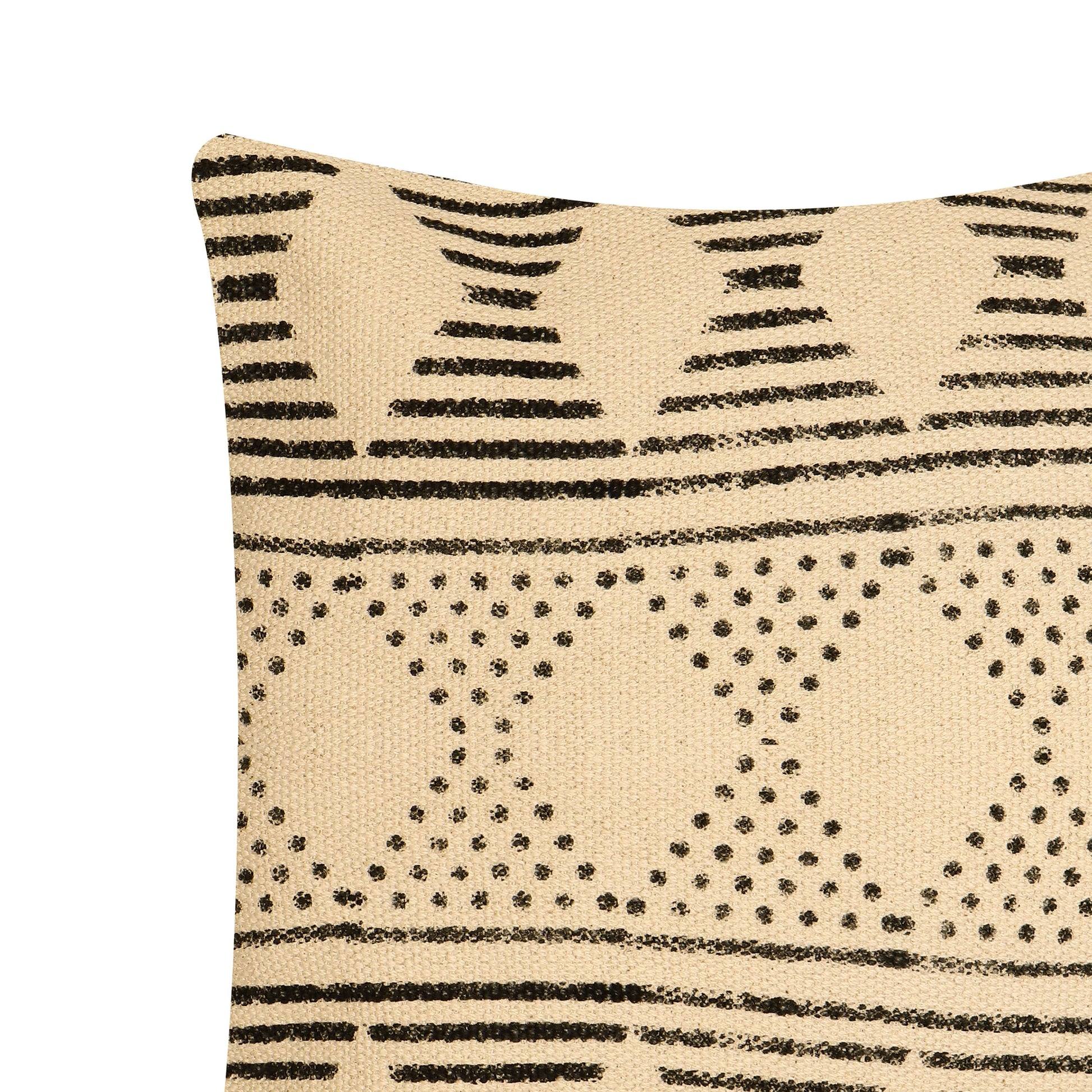 A beige and black tribal motif pillow cover