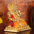 Gold plated Dagdushet Ganesha Idol on the golden base, side angel photo