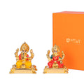 Gold Laxmi Ganesha Idol set with orange color box of wemy