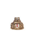A golden idol of Lord Balaji's Charan Paduka, depicting the sacred feet of Lord Venkateswara adorned with the Shanku, Chakra, and Namam symbols.