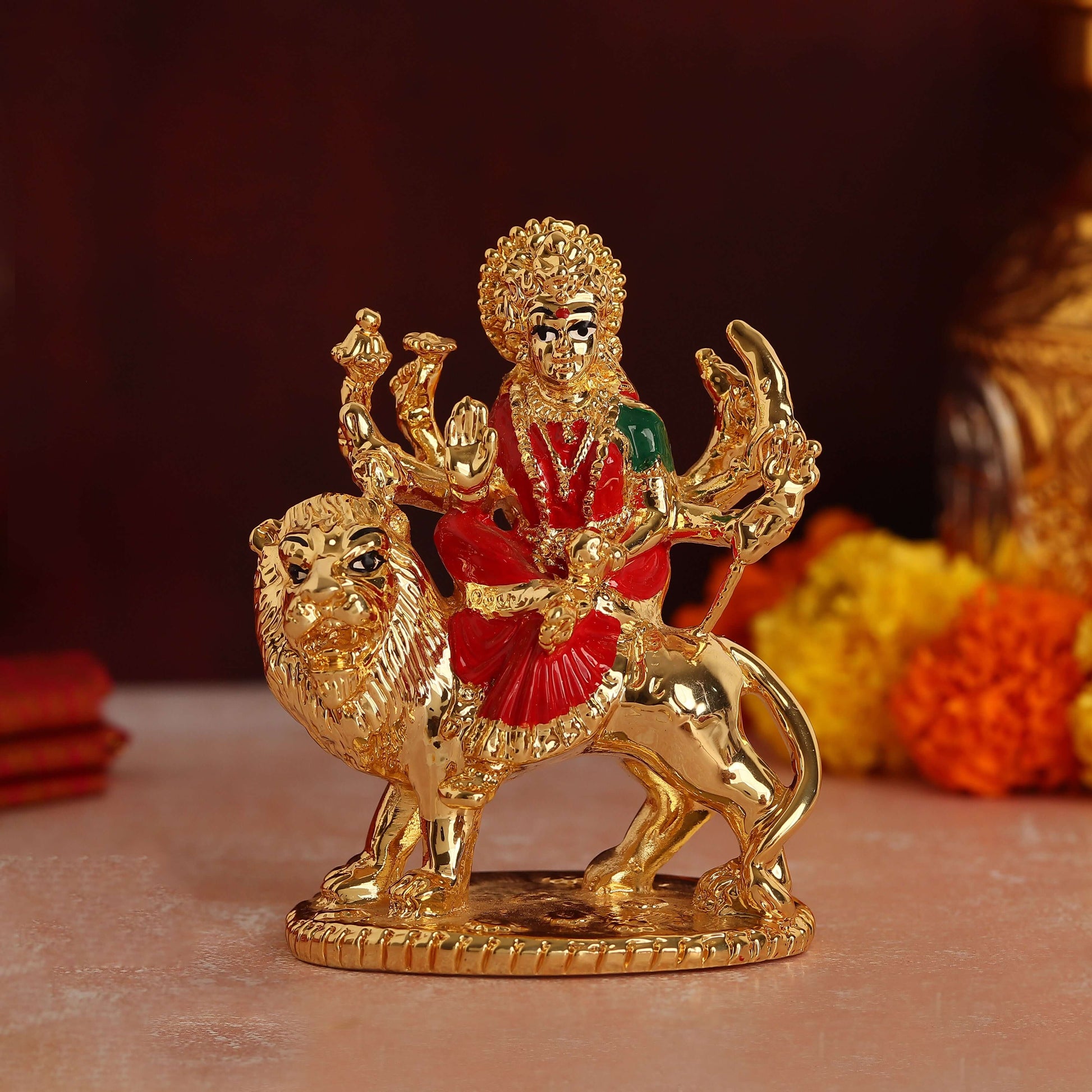 Place this beautiful Gold Plated Goddess Maa Durga Sherawali MATA idol on your car dashboard for divine protection and blessings during your journeys, or display it in your home mandir/puja room or office for spiritual upliftment and positive energy, or gift it to loved ones on auspicious occasions like housewarmings or festivals