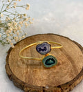 2 stone adjustable purple and green color ear cuff