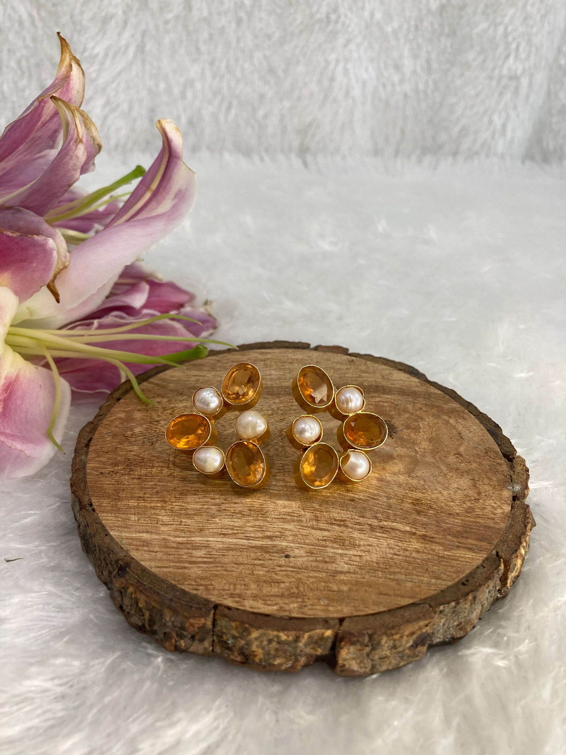 Six orange stone earrings