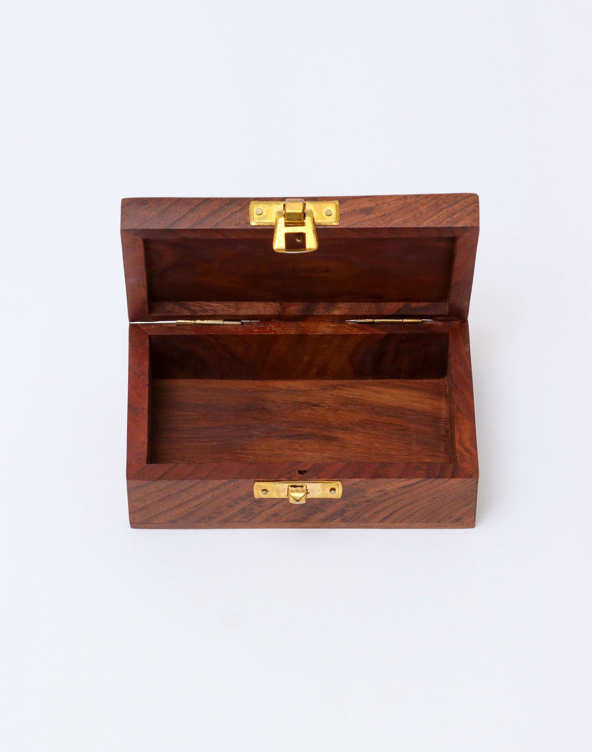 A small, open wooden box with a gold latch is shown on a plain white background. The box is made of dark wood and is empty, revealing a single compartment inside.