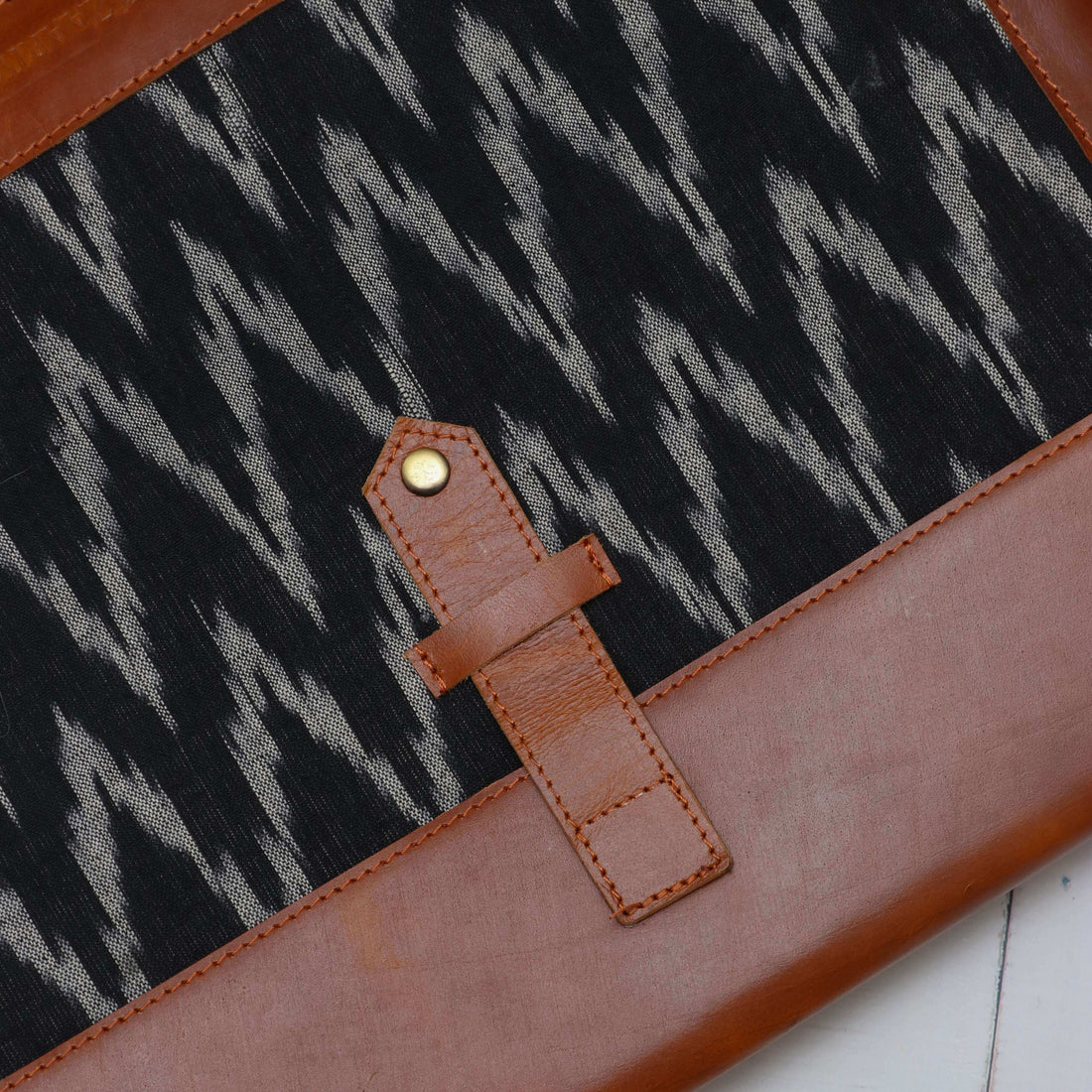 Leather and block print Laptop sleeve with flap closure