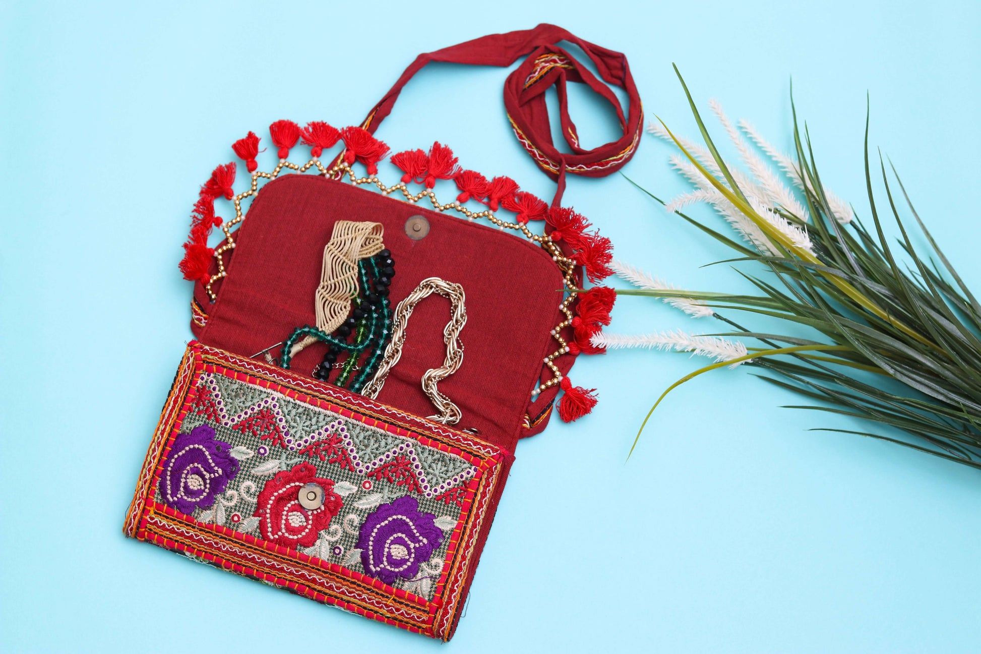 Red color design Handmade Embroidered purse with malas in it