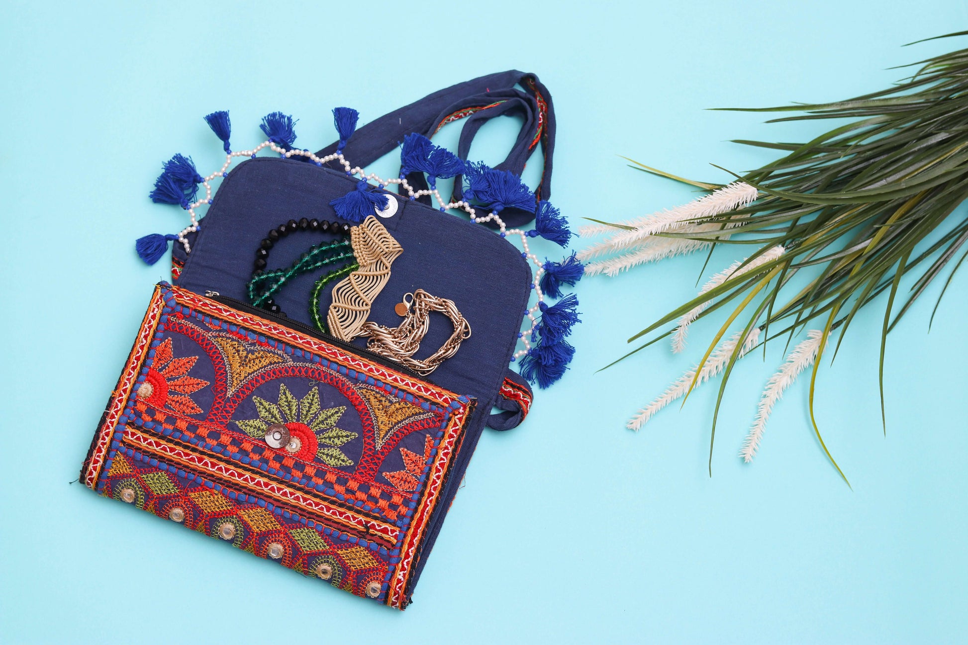 purple color design Handmade Embroidered open purse with malas in it