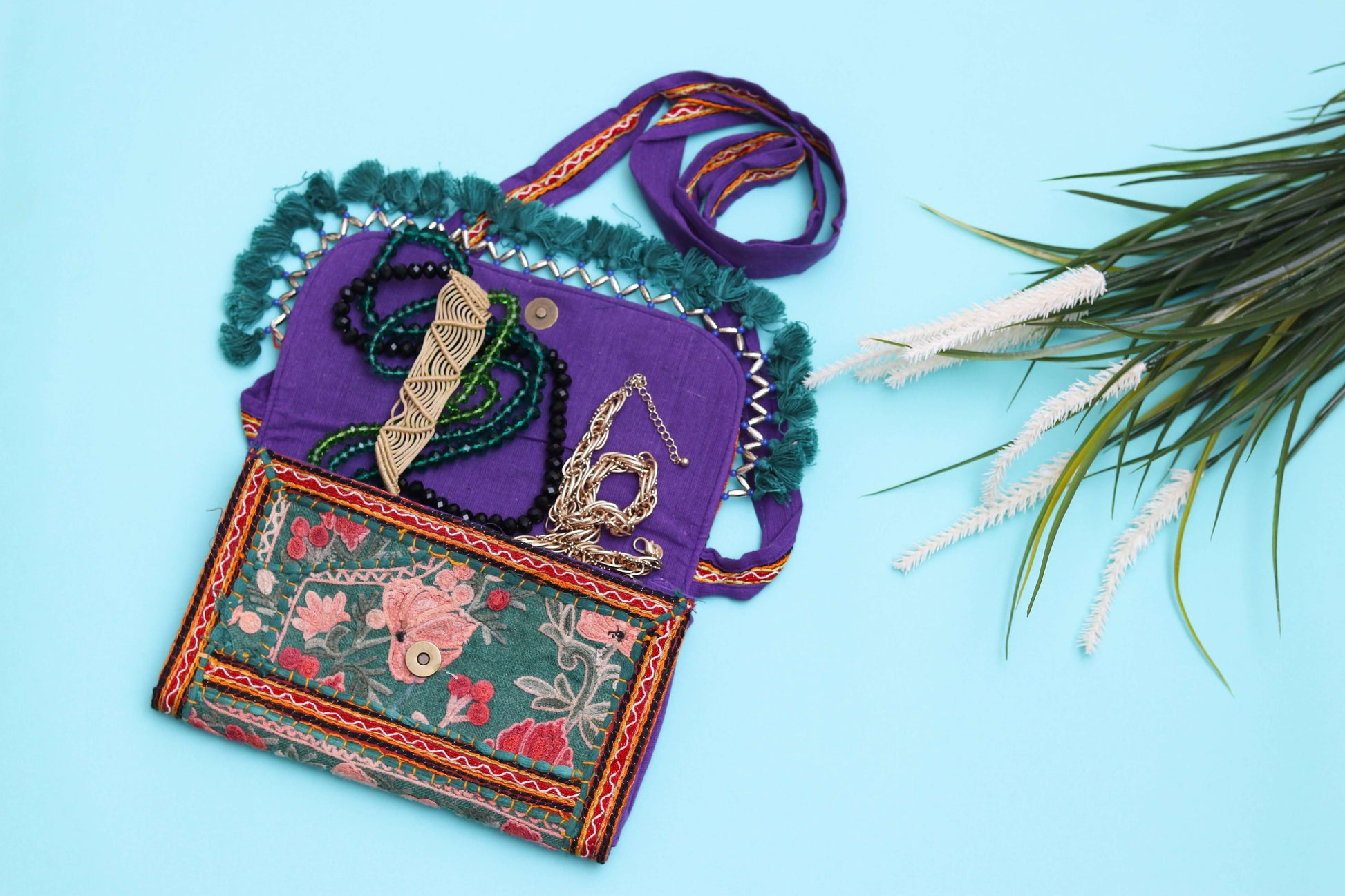 purple color design Handmade Embroidered purse with malas in it