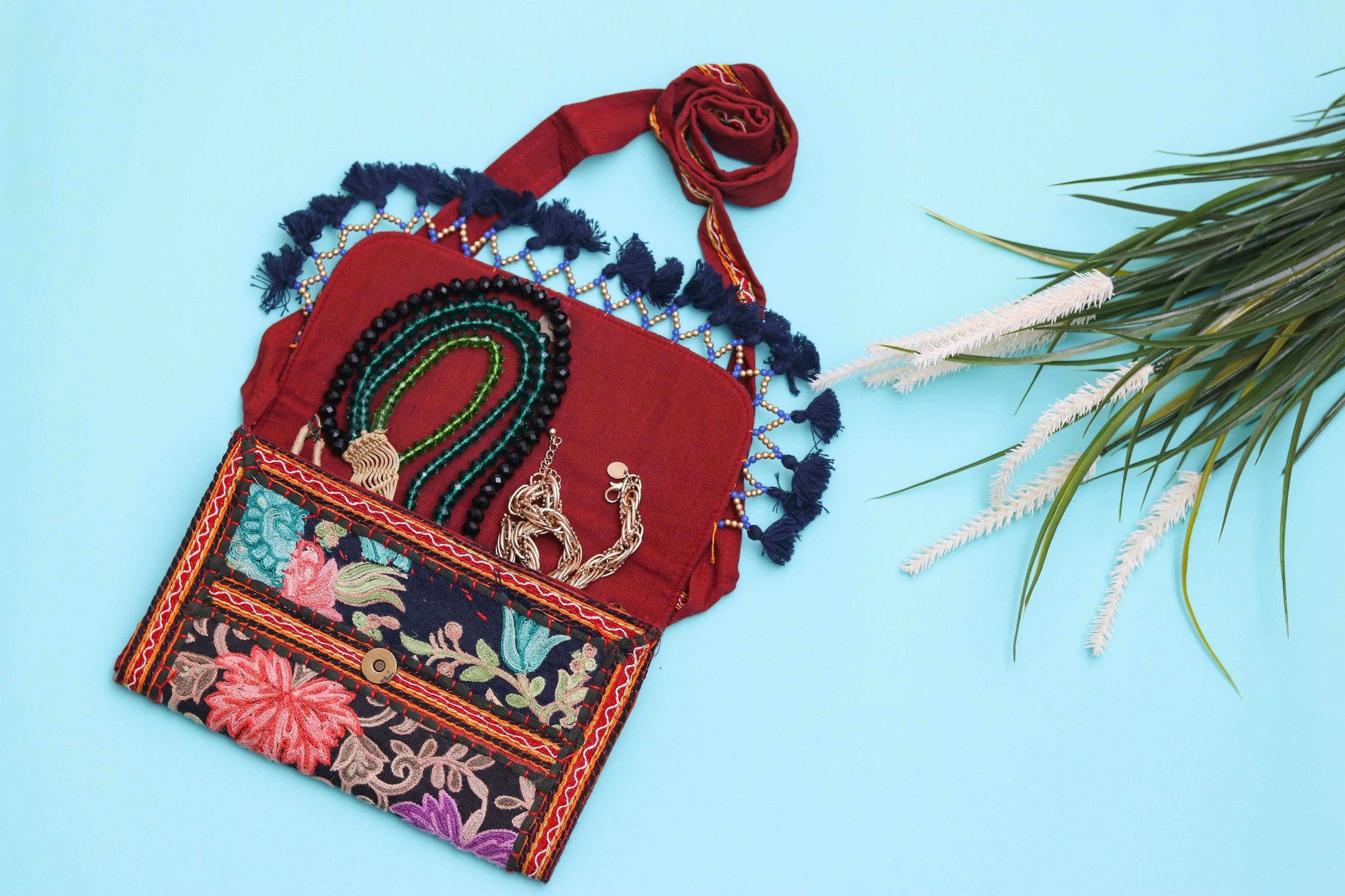 marun color design Handmade Embroidered open purse with malas in it