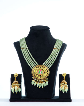Long Necklace with Light Green Beads and Filigree Pendant