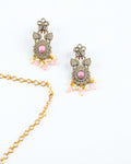 A Victorian-style earrings in pink color with gold plated chain