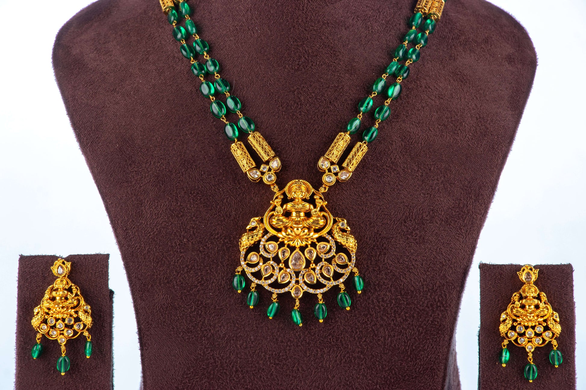 Beaded green mala Necklace with Pendant and matching set of earrings with it in the maroon shawpiece