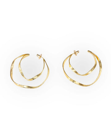 A pair of gold double twisty hoop earrings on a white background.