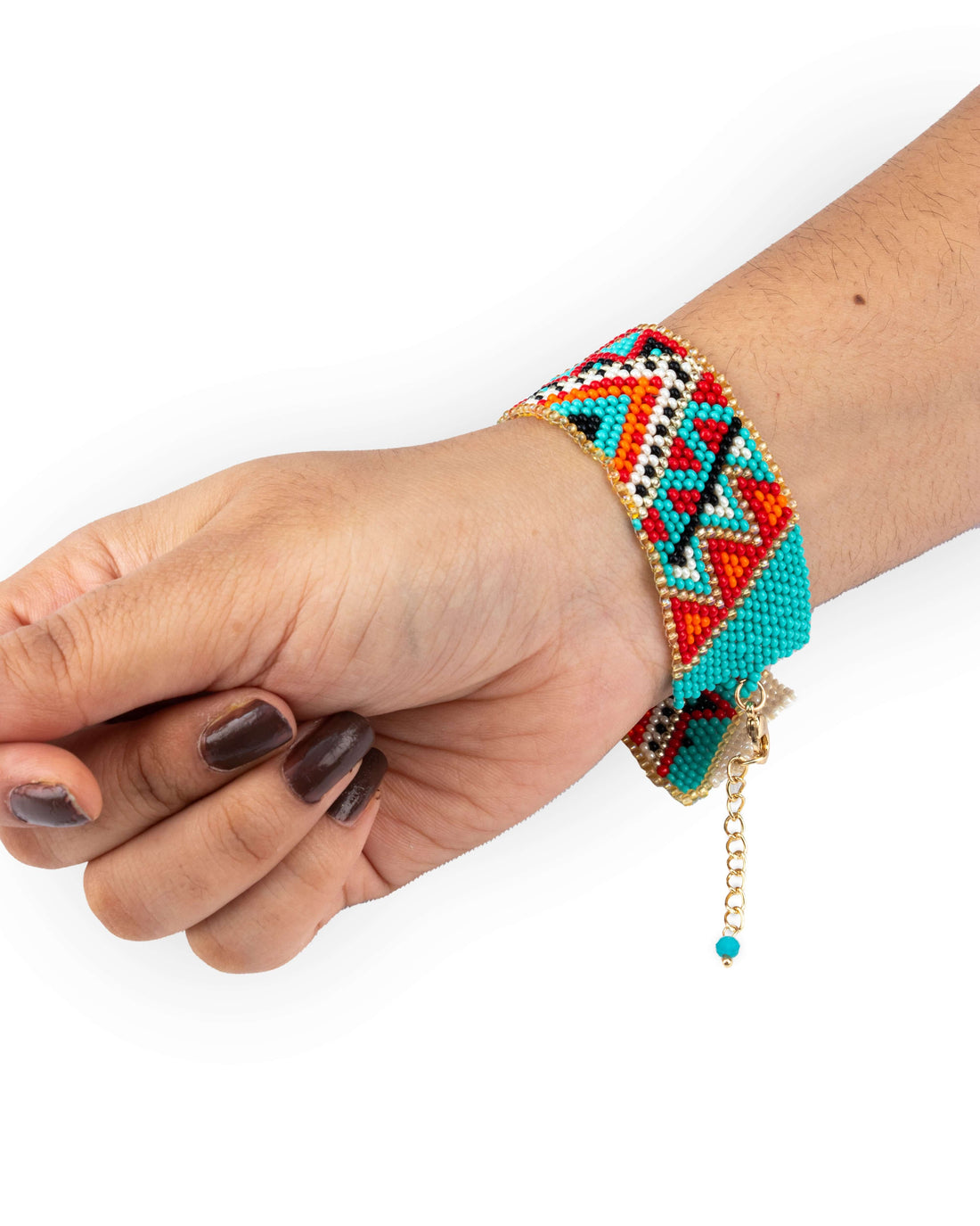 A colorful beaded bracelet on a person's wrist, featuring a vibrant palette with various colored beads and a gold-tone charm.