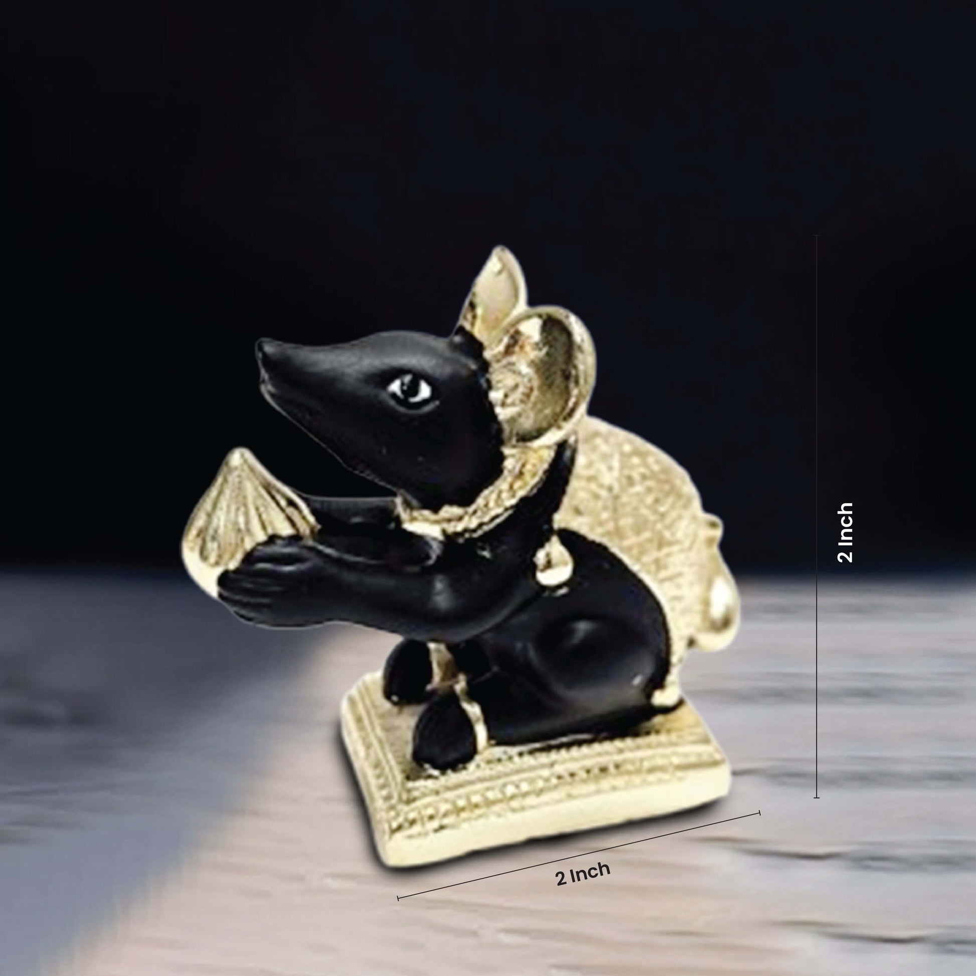 Mushak Idol in black color with golden base