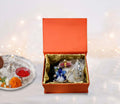 A rakshabandhan hamper open box with pooja thali
