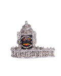 Silver-plated idol of Mahakaleshwar Jyotirlinga with an antique finish, intricately detailed and depicting the face of Lord Shiva.