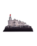 A silver-plated miniature model of the Ayodhya Ram Mandir on a black base.