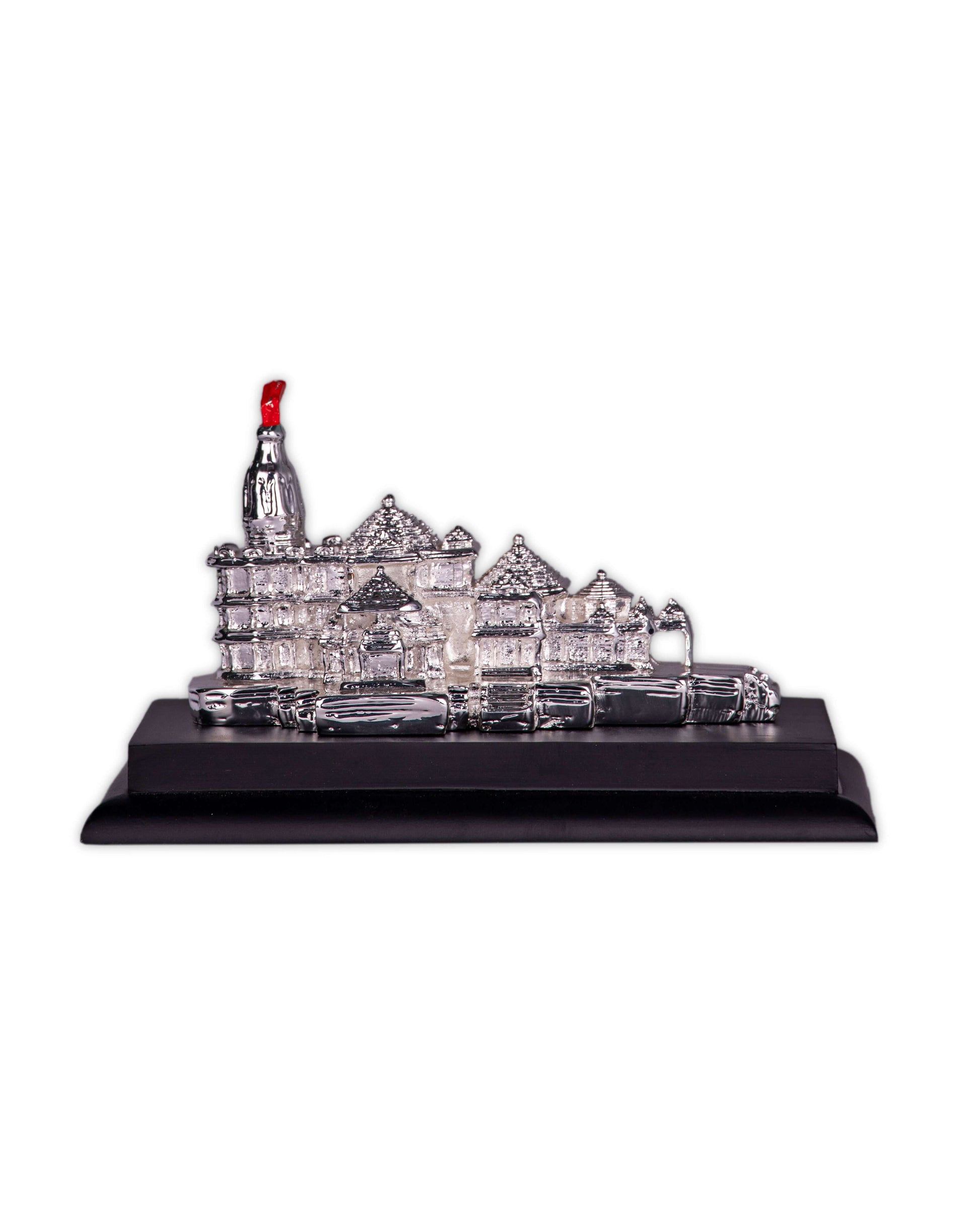 A silver-plated miniature model of the Ayodhya Ram Mandir on a black base.
