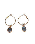 Turquoise stone golden hoop on the white background