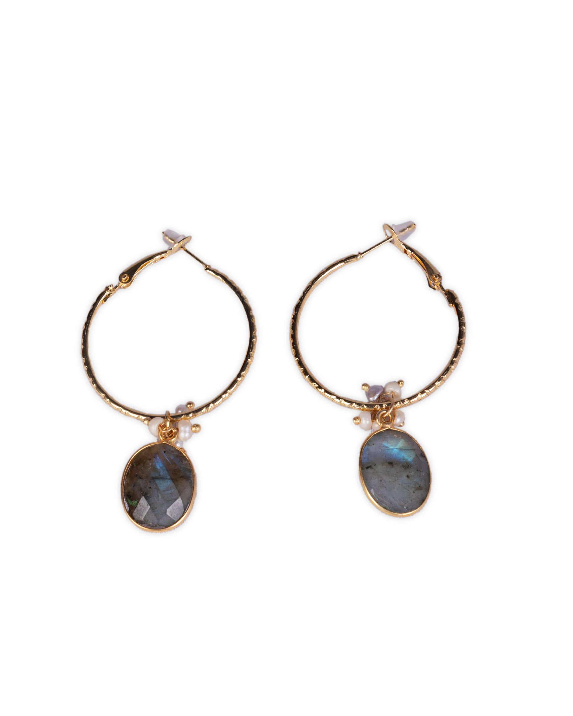Turquoise stone golden hoop on the white background