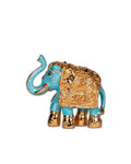 A gold-plated resin elephant show piece with blue accents, positioned against a purple background with decorative elements on both sides.