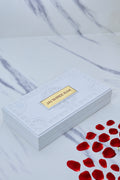 An image featuring a sleek white box, likely a