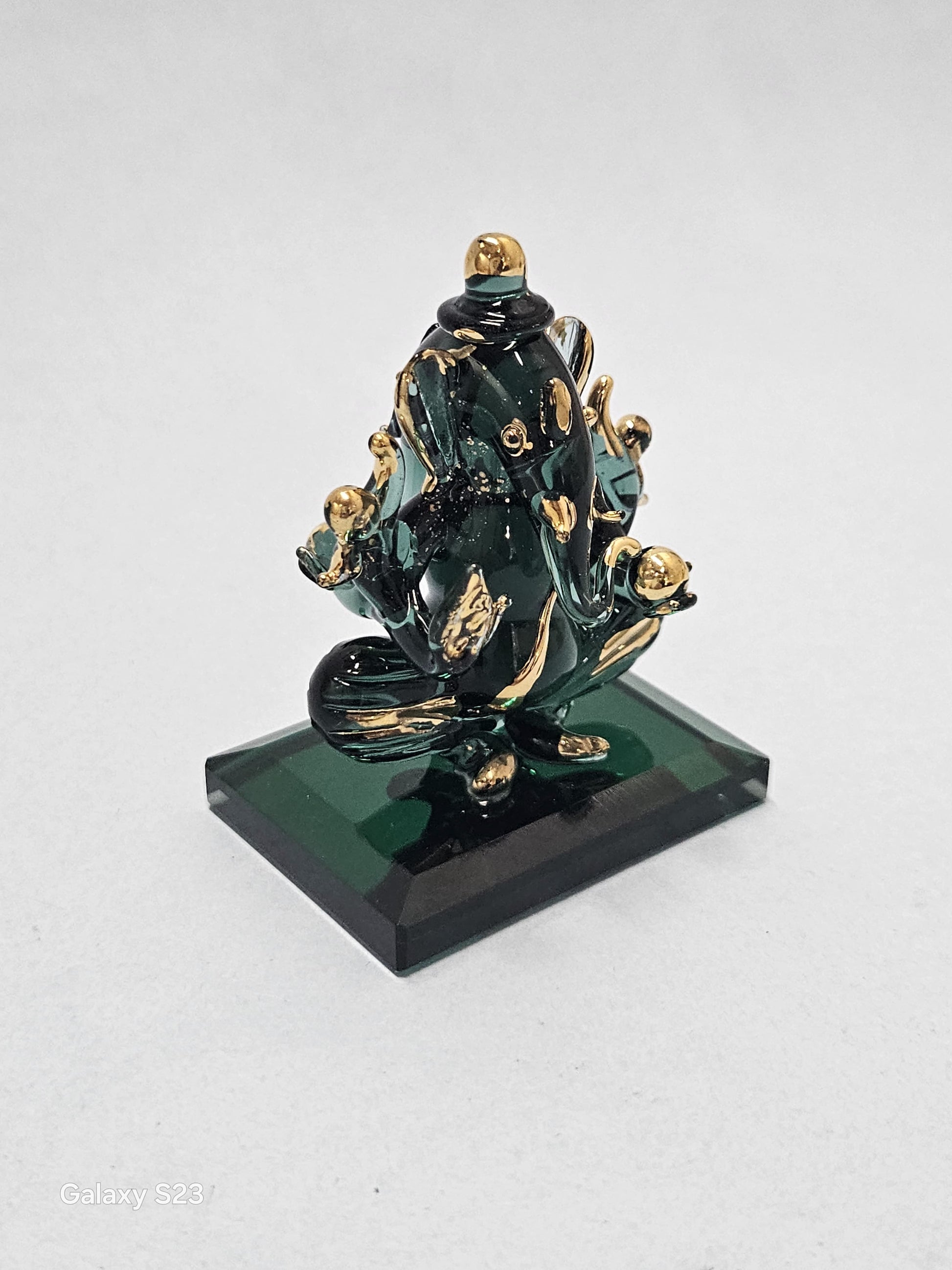 Double Face Glass Ganesha Idol side angle photo