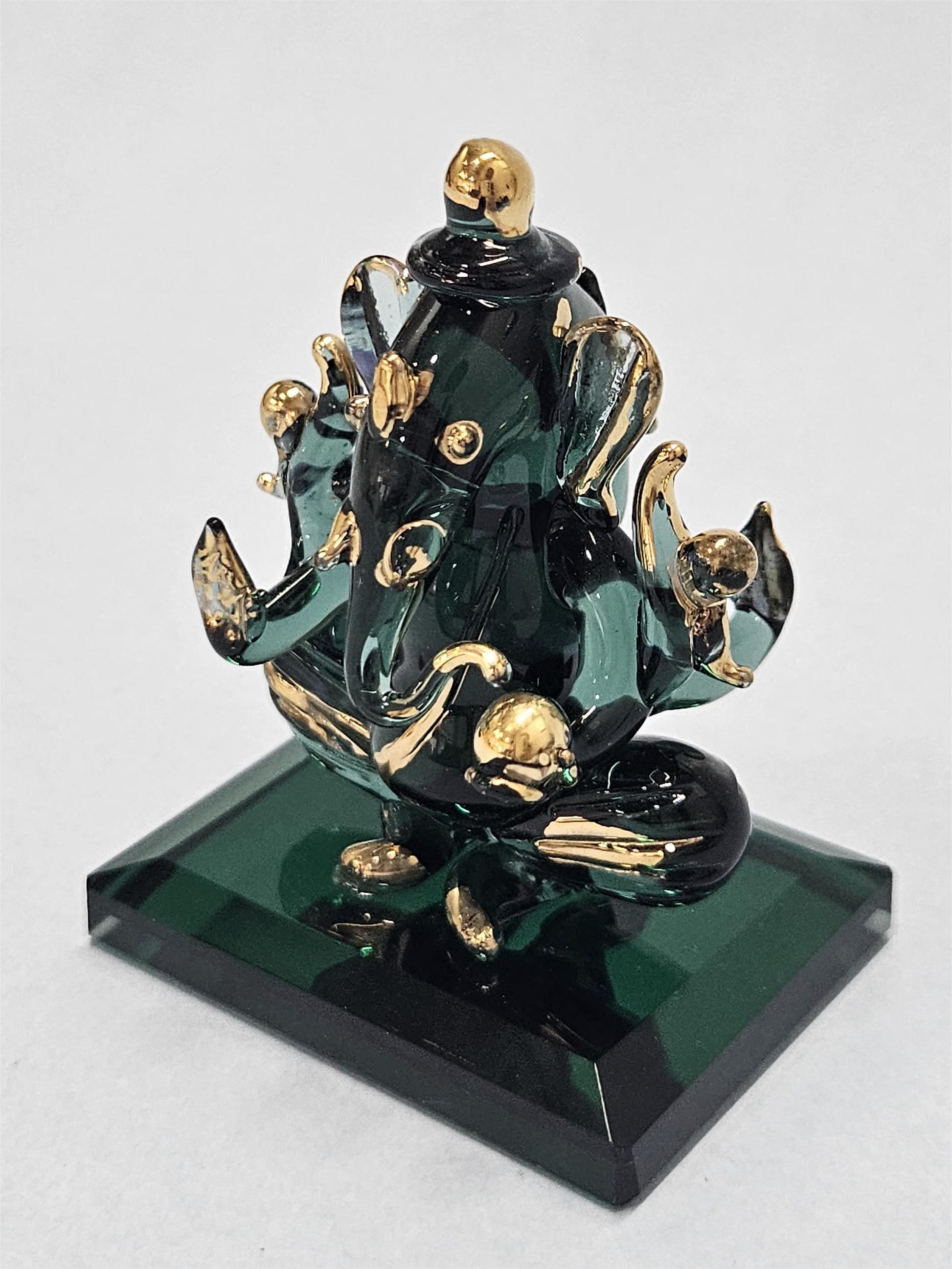 Double Face Glass Ganesha Idol on the glass base