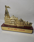A sacred golden idol representing the Shree Ram Mandir of Ayodhya, designed for spiritual and decorative purposes.